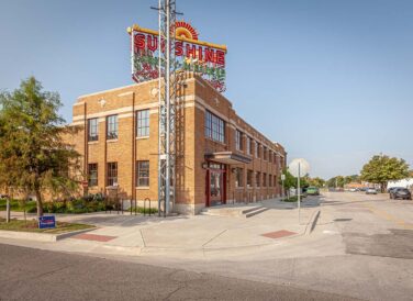 corner view of building by NW 23rd